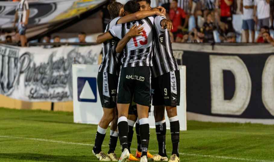 Football team celebrating together